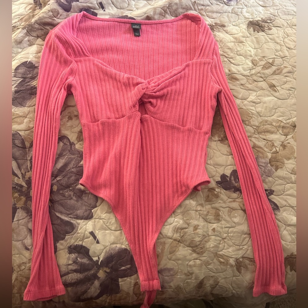 Women’s pink body suit